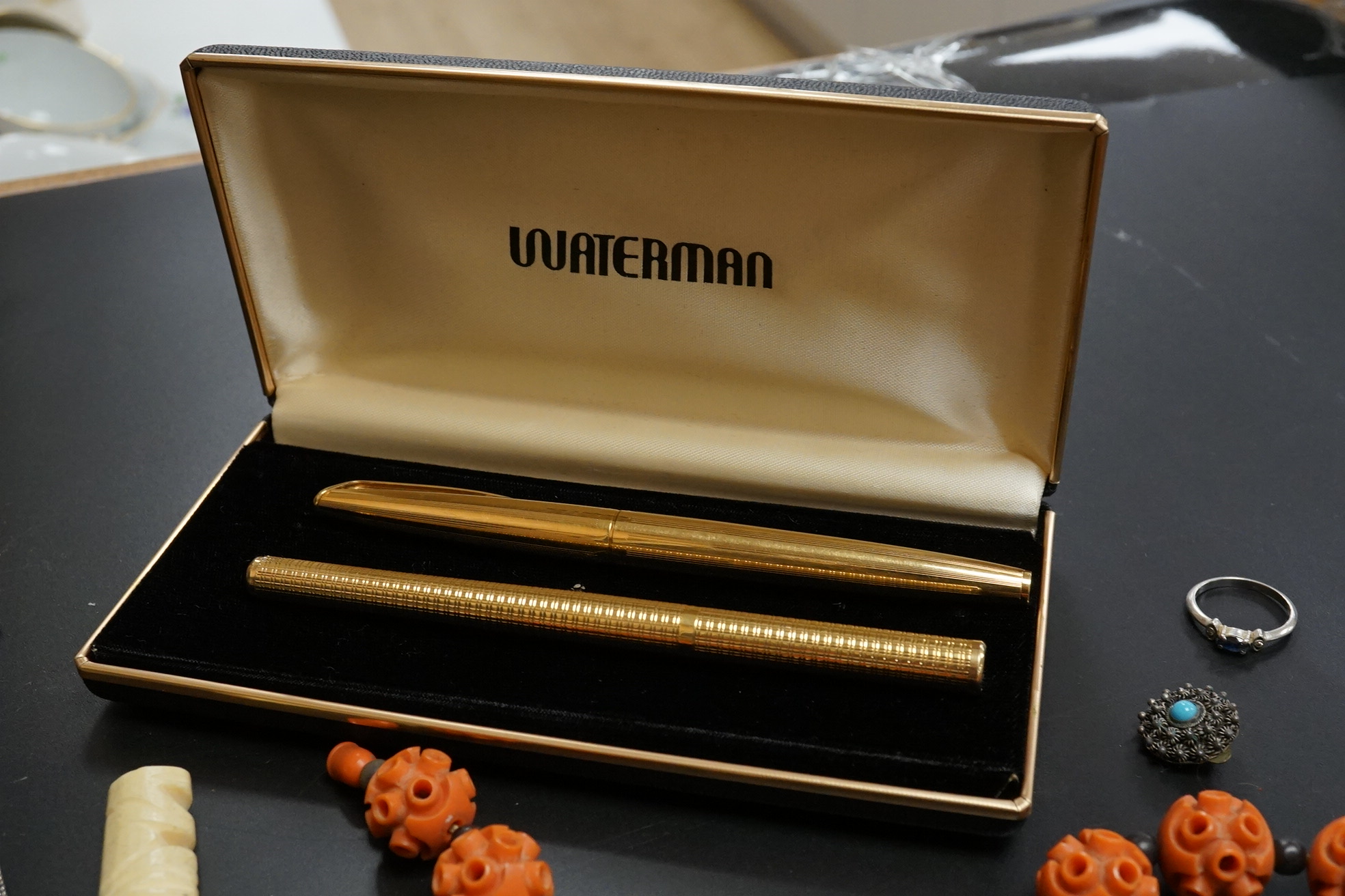 A small group of assorted costume and other jewellery, including a late Victorian silver hexagonal brooch(a.f.) a platinum and gem set ring and two pens Waterman and Elysee.